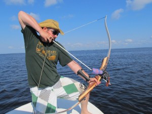The author, bowfishing for cownose rays. 
