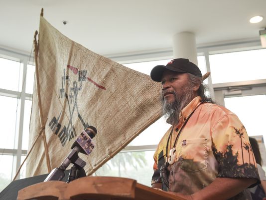 Ignacio R. "Nash" Camacho, a Traditions About Seafaring Islands member, and codesigner of the Chamoru Sakman outrigger replica canoe "Tasi," talks about his creation during a ceremony at the Guam Museum on June 29, 2017.
